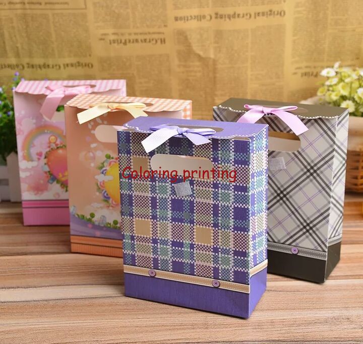 handling reusable high quality hot stamping black hand hard paper bag for birthday gifts packaging